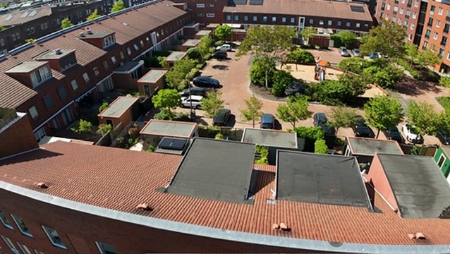 Dakinspectie Amsterdam vanuit de lucht